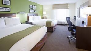 Pillowtop beds, desk, blackout drapes, iron/ironing board