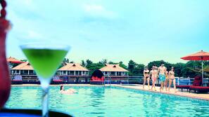 Outdoor pool, open 8 AM to 8 PM, free pool cabanas, pool umbrellas