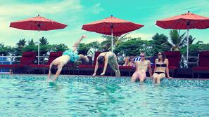 Outdoor pool, open 8 AM to 8 PM, free pool cabanas, pool umbrellas