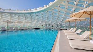 2 outdoor pools, pool umbrellas, pool loungers