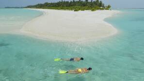 Private beach, white sand, free beach cabanas, sun loungers