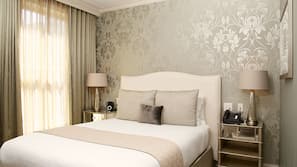 Premium bedding, pillow top beds, in-room safe, blackout curtains