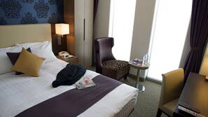 Premium bedding, down comforters, in-room safe, desk
