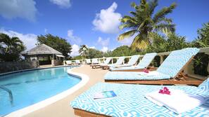 Outdoor pool, pool umbrellas, sun loungers