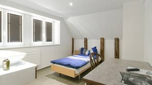 Desk, blackout drapes, soundproofing, iron/ironing board
