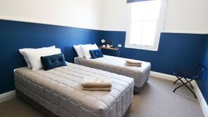 Blackout curtains, iron/ironing board, free WiFi, linens