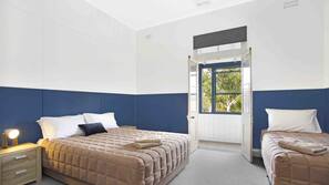 Blackout curtains, iron/ironing board, free WiFi, linens