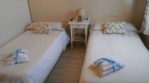 Premium bedding, iron/ironing board, free cribs/infant beds, free WiFi