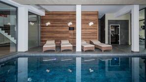 Indoor pool, open 9 AM to 8 PM, sun loungers