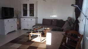TV, DVD player, ping pong table, books