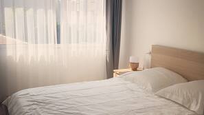 1 chambre, fer et planche à repasser, accès Internet, draps fournis