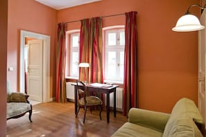 Standard Double Room | Living area | 32-inch flat-screen TV with cable channels, TV