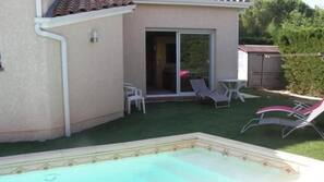 Seasonal outdoor pool, open 9 AM to 9 PM, pool loungers