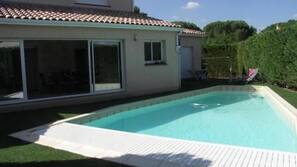 Seasonal outdoor pool, open 9 AM to 9 PM, pool loungers