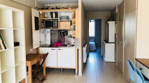 Fridge, microwave, hob, coffee/tea maker