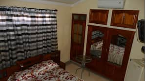 Blackout drapes, iron/ironing board, linens