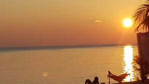 On the beach, beach massages, beach yoga