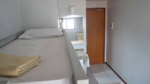 Cortinas blackout, Wi-Fi de cortesia, roupa de cama