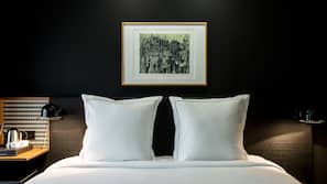 Premium bedding, down comforters, in-room safe, soundproofing