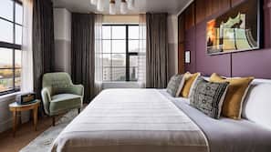 Premium bedding, down comforters, memory foam beds, in-room safe