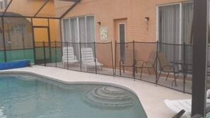 Seasonal outdoor pool, pool umbrellas, pool loungers