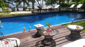 Outdoor pool, open 7 AM to 9 PM, sun loungers
