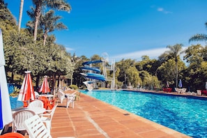 Indoor pool, outdoor pool, pool umbrellas, sun loungers