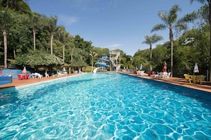Indoor pool, outdoor pool, pool umbrellas, sun loungers