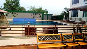 Outdoor pool, open 8 AM to 9 PM, pool umbrellas, sun loungers