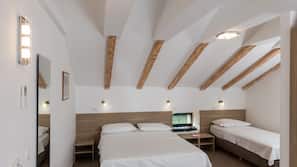 Een minibar, een kluis op de kamer, een bureau, gratis babybedden
