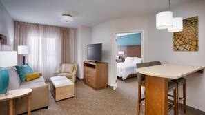 Hypo-allergenic bedding, down comforters, desk, laptop workspace