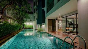 Outdoor pool, open 7:00 AM to 10:00 PM, pool umbrellas, pool loungers