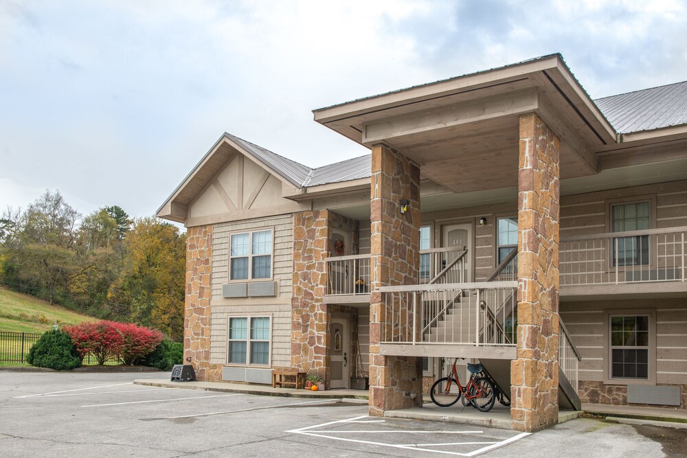 Riverfront condo with shared pool, firepit & decks walk to trails in