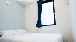 Blackout curtains, iron/ironing board, free WiFi, linens