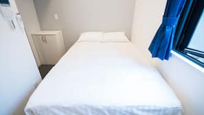Blackout curtains, iron/ironing board, free WiFi, linens