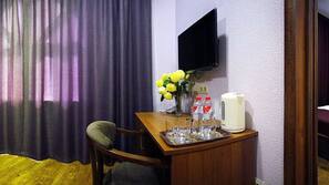 Premium bedding, down comforters, in-room safe, desk