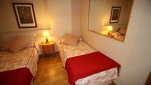 Blackout curtains, iron/ironing board, linens
