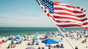 On the beach, sun-loungers, beach towels