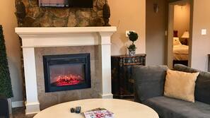 TV, fireplace, toys, books