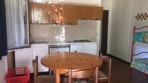Fridge, hob, cookware/dishes/utensils