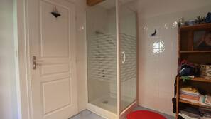 Separate bathtub and shower, deep-soaking bathtub, hair dryer, towels