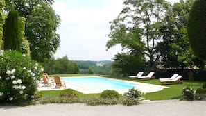 Outdoor pool, pool umbrellas, pool loungers