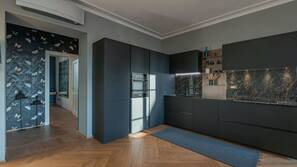 Full-sized fridge, oven, hob, dishwasher