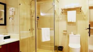 Shower, free toiletries, slippers
