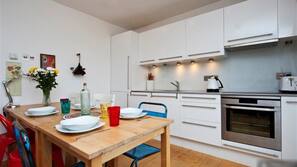 Dishwasher, coffee/tea maker, cookware/dishes/utensils