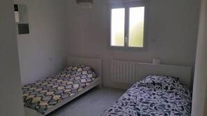2 bedrooms, blackout drapes, iron/ironing board, free WiFi