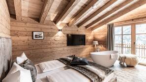 Flat-screen TV, fireplace, tablet, heated floors