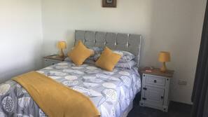 2 bedrooms, premium bedding, blackout drapes, iron/ironing board