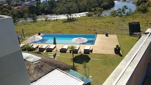 Outdoor pool, open 8:00 AM to 8:00 PM, sun loungers
