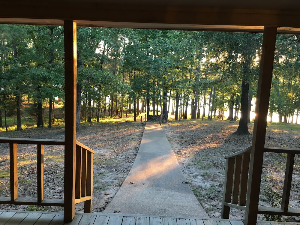 Waterfront Vacation Home, GolfFishSwim, Sleeps 12 in Wooded Resort